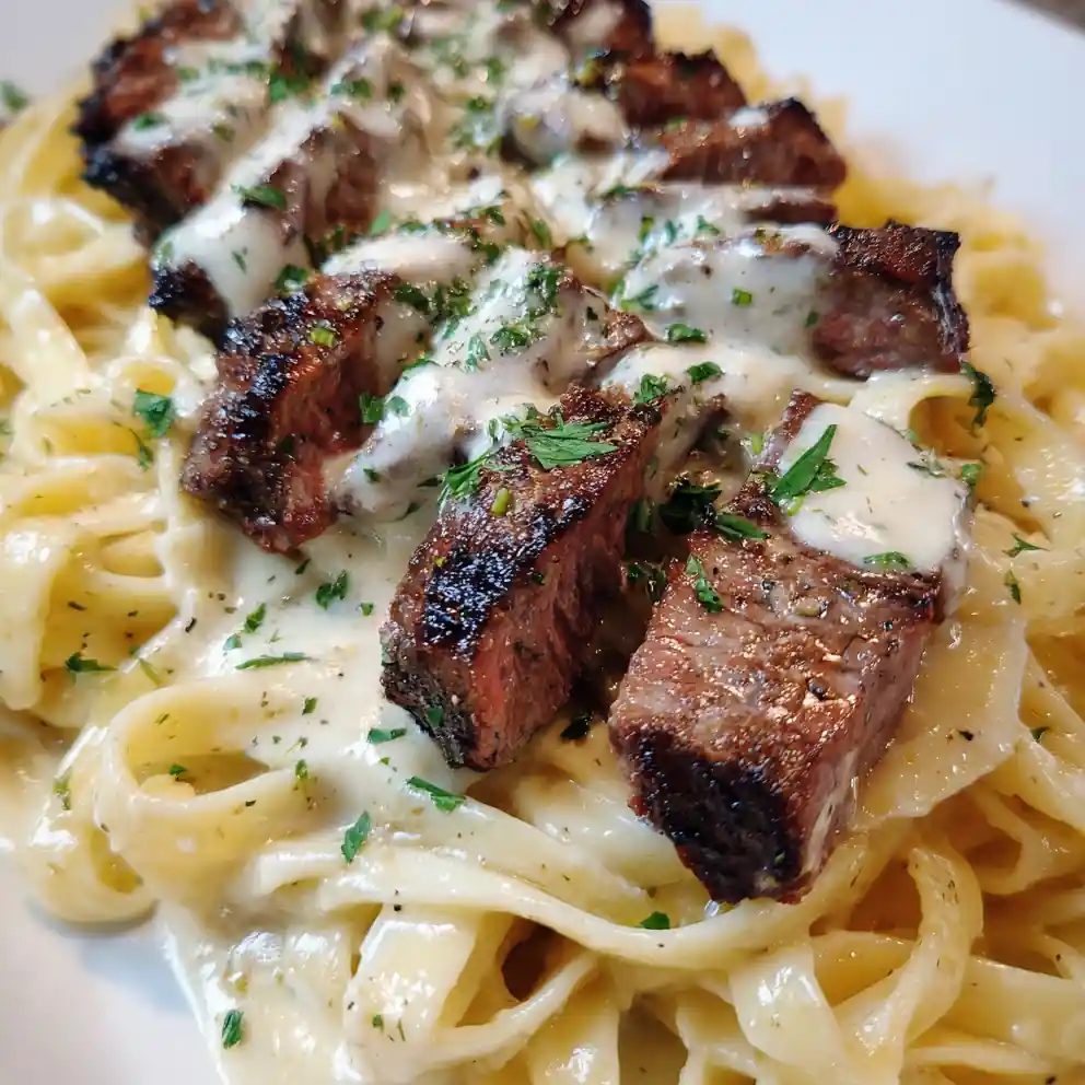Steak Alfredo Recipe Charred Strips Over Snowy Alfredo With Parsley 6 steak alfredo recipe Charred Strips over Snowy Alfredo with Parsley