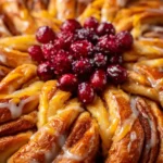 Cinnamon Roll Snowflake Recipe Orange Glaze And Cranberry Sparkle 1762480685.819503